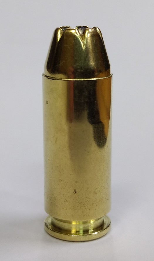 155 MG loaded in 10mm Mag cut down to standard 10mm